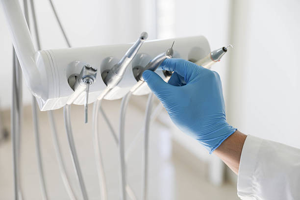 Professional Tooth Extraction technician working in Galveston, IN
